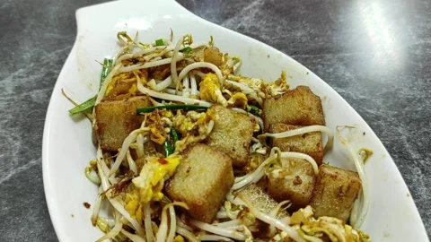 A plate of carrot cake on marble table Stock Footage 263600799