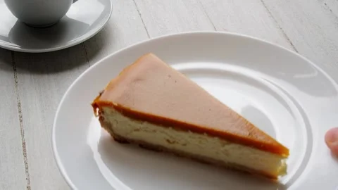 Plate cheesecake placed table on white background. Stock Footage 171608385