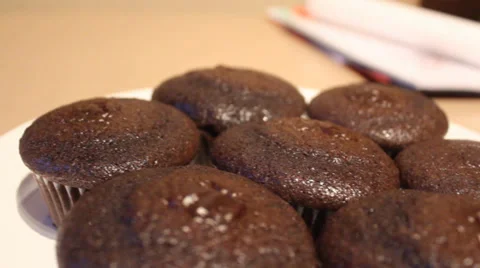 Plate of Chocolate Muffins Stock Footage 35518305