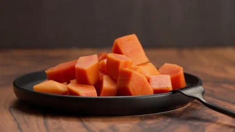A plate with chopped papaya for breakfast Stock Footage 328896544