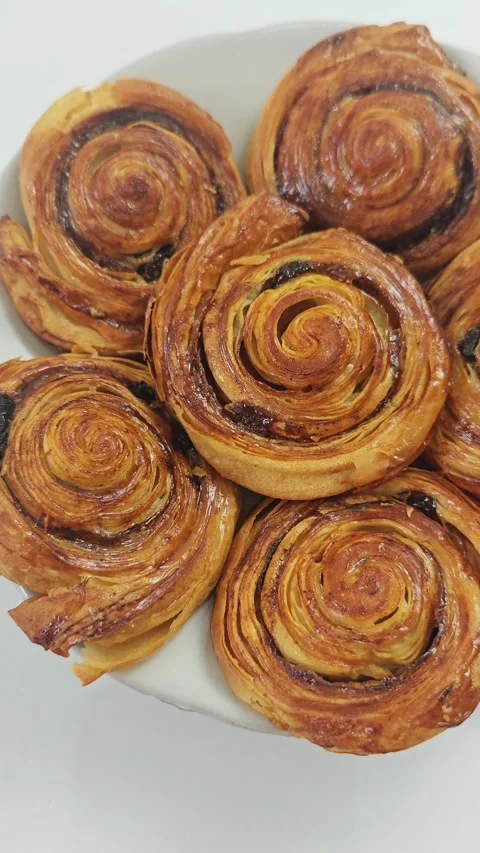 A plate of cinnamon rolls Stock Footage 341630021