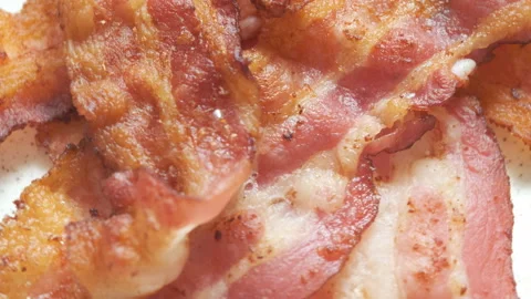Plate with cooked bacon Stock Footage 101336496
