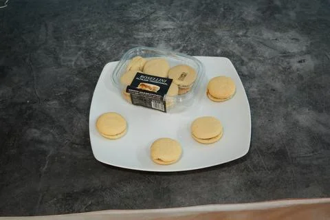 A plate of cookies is on a table Stock Photos