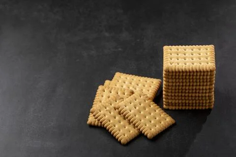 Plate with cornstarch biscuit on the table. Stock Photos