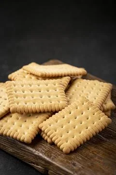 Plate with cornstarch biscuit on the table. Stock Photos