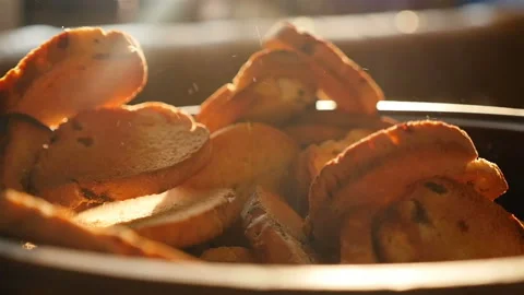 Plate with crackers. Slow motion. Close-up Stock Footage 144387326