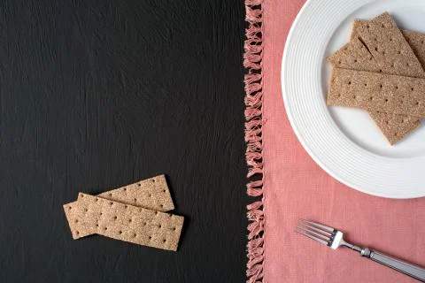 Plate with crispbread on the table Stock Photos