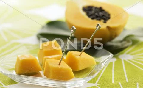 Plate of cutted fruit papaya Stock Photos