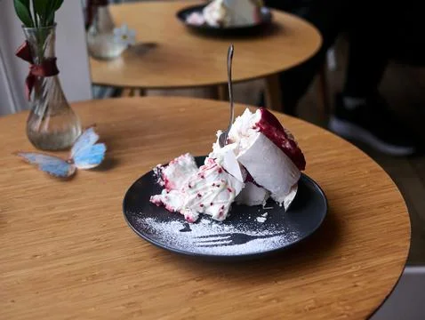 A plate of dessert with a fork in it Stock Photos