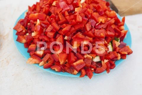 Plate with diced pepper Stock Photos