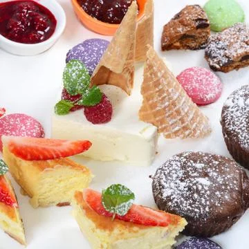 Plate of different desserts isolated Stock Photos