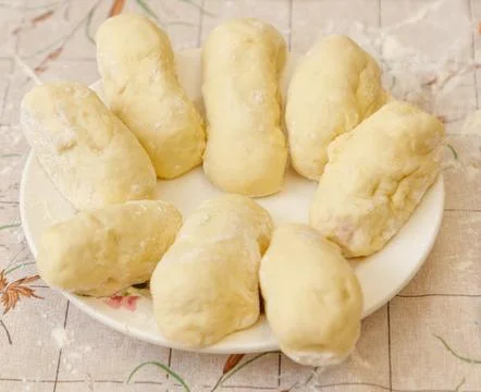 A plate of doughnuts with a floral pattern on it 写真素材