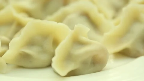 A plate of dumplings on the table (2) Stock Footage 202158699