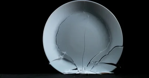 Plate falling and exploding on Black Background, Slow Motion 4K Stock Footage 75980912