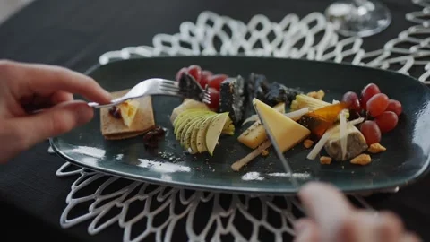 A plate of food with a fork in it Stock Footage 295995668