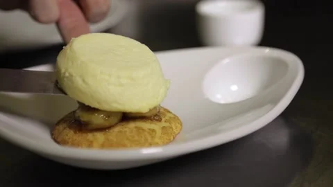 A plate of food on a table Stock Footage 155451373
