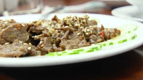 A plate of food on a table Stock Footage 155456028