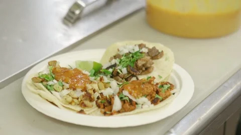A plate of food on a table Stock Footage 155456161