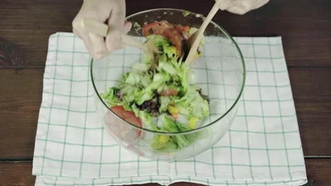 A plate of food on a table 库存影片 157872255