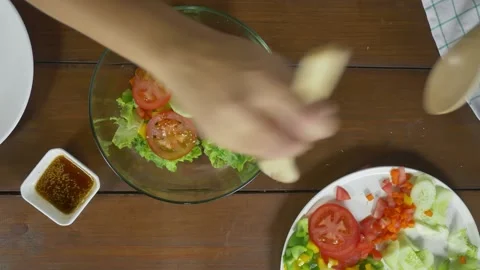 A plate of food on a table 스톡 동영상 157872394