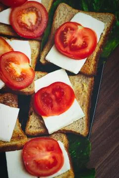 Plate with fresh aperitifs on the table Stock Photos