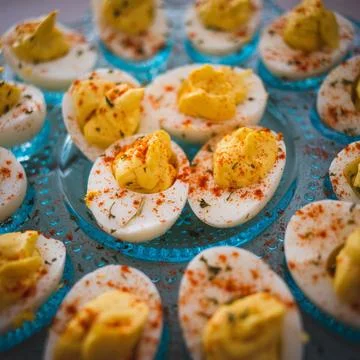 Plate with freshly made deviled eggs 스톡 사진