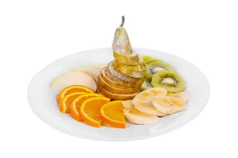 A plate with fruit sliced isolated Stock Photos