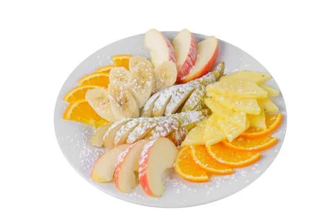 A plate with fruit sliced isolated Stock Photos