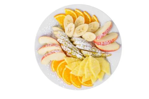 A plate with fruit sliced isolated Stock Photos