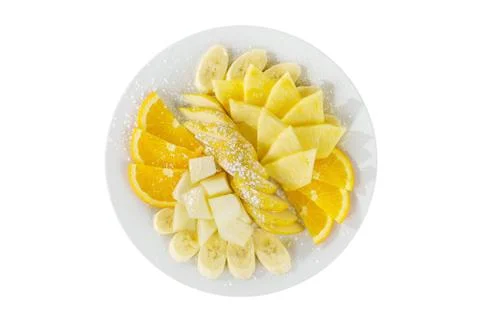 A plate with fruit sliced isolated Stock Photos
