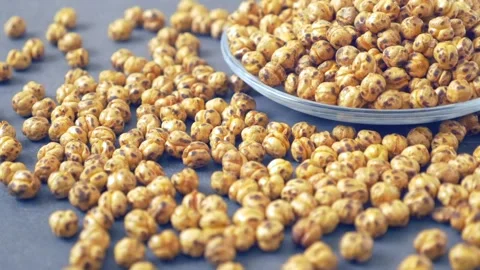 A plate full of freshly roasted orum roasted chickpeas, Stock Footage 259317348