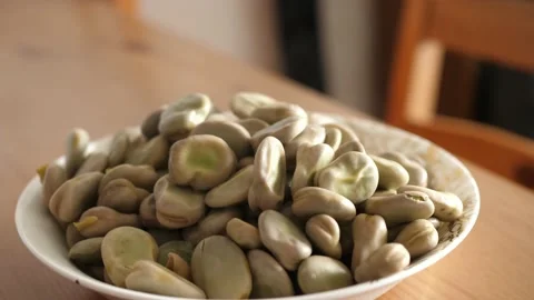 Plate full of hot fresh cooked steaming broad beans Stock-Footage 136948592