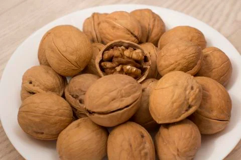 Plate full of nuts Stock Photos