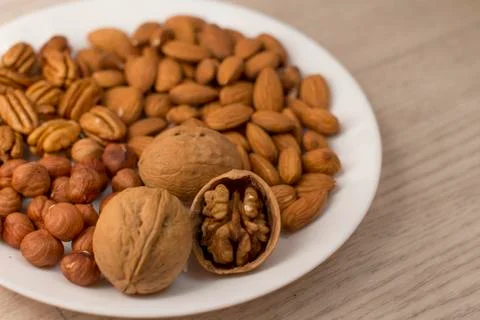 Plate full of nuts Foto stock