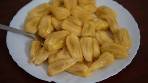 A PLATE FULL OF RIPE JACK FRUIT Stock Footage 236711985