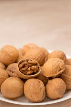 Plate full of wallnuts Stock Photos