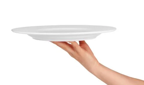 Plate on hand Stock Photos