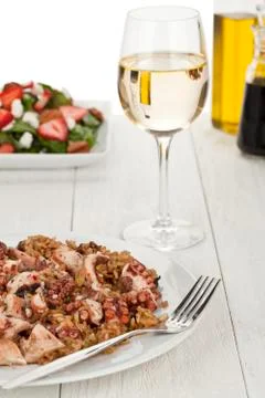 A plate with italian octopus risotto Stock Photos