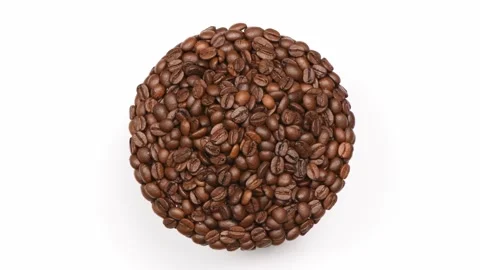 A plate made of coffee beans on white. Tope view. Loop motion. Rotation 360. Stock Footage 245083444