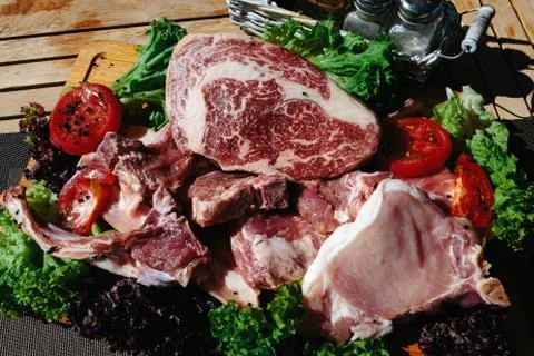 A plate of marble beef with vegetables Stock Photos