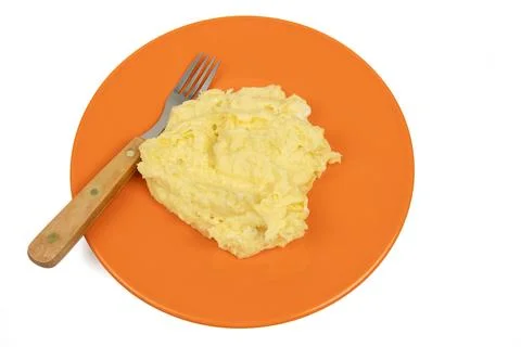 Plate of mashed potatoes, top view, isolated on a white background Stock Photos