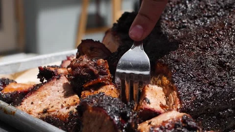 Plate of meat and fork picking up one piece 스톡 동영상 137446241