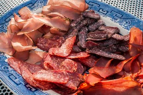 Plate with meat appetizers Stock Photos