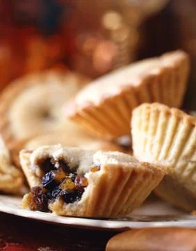 Plate of mince pies, missing bite Stock Photos