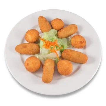 Plate of mixed ham and cod croquettes with lettuce. Stock Photos
