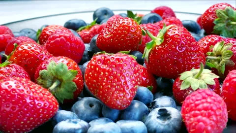 Plate of mixed wild berries Stock Footage 138273177