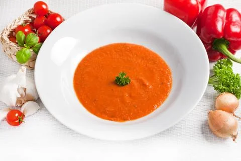 Plate of nutritious vegetable soup with pumpkin Foto stock