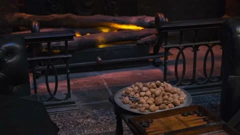 Plate Of Nuts With Nutcracker On Center Table Near Antique Fireplace With Stock Footage 222047779