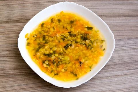 Plate of pea soup is on the table Stock Photos