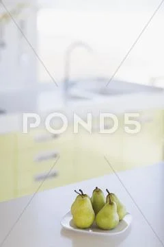 Plate Of Pears On Kitchen Counter